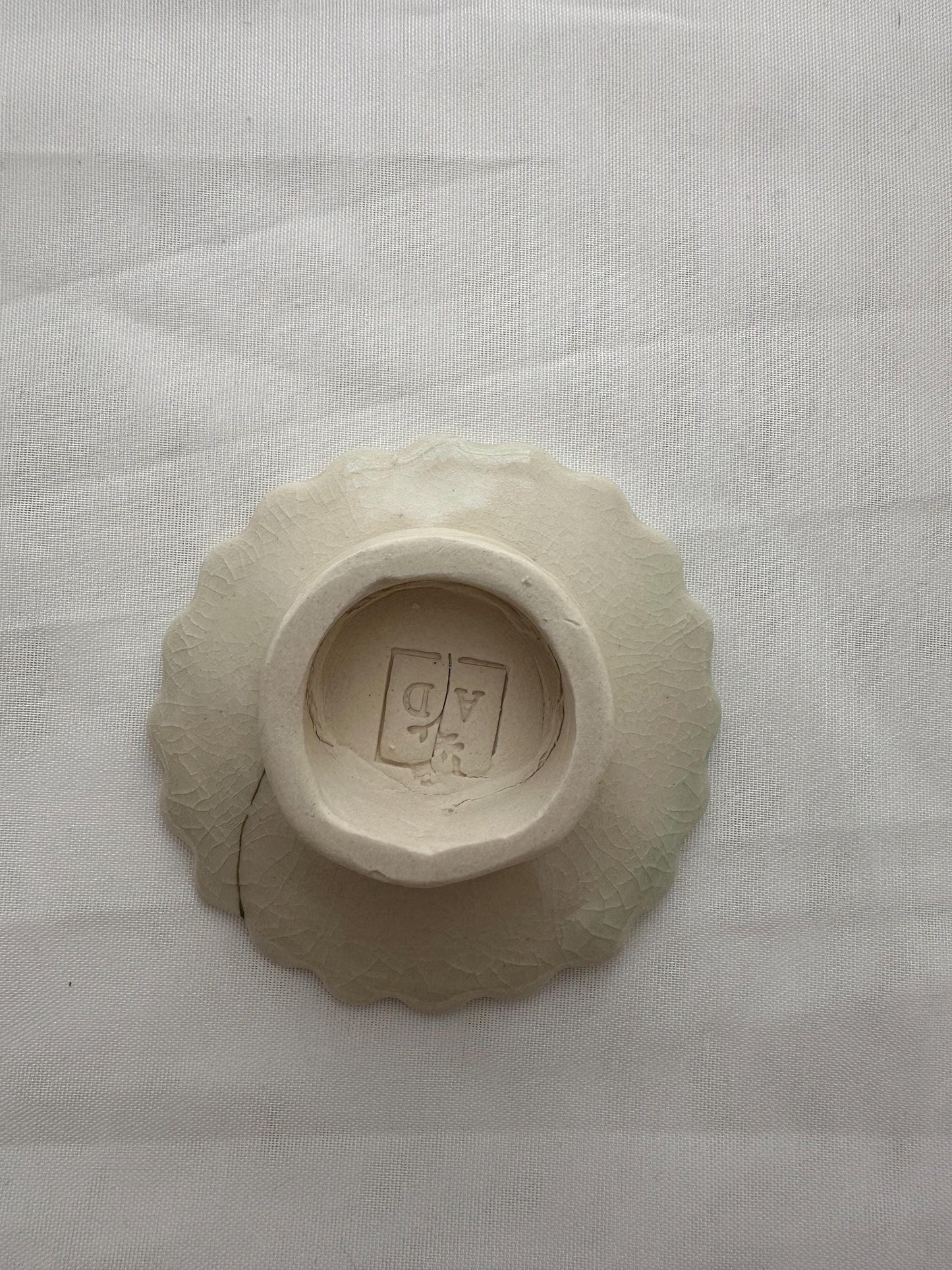 Handmade and hand painted pottery trinket dish, with handpainted green underglaze and finished in a clear glaze, 3” with foot
