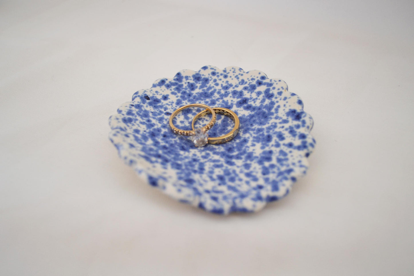 Handmade trinket dish with scalloped edges and vibrant blue splatterware glaze, Matte Finish, 3 Inches Diameter