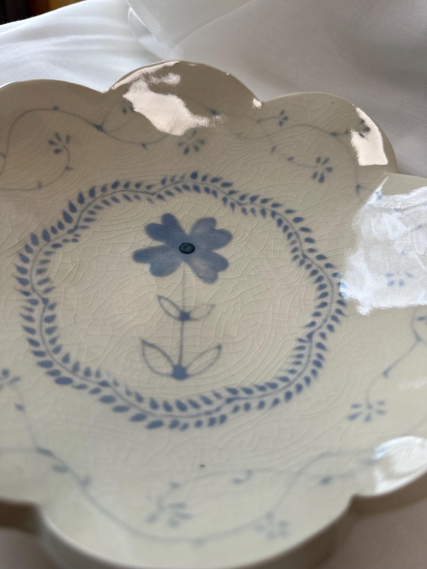 Handmade and hand painted pottery bowl, with handpainted blue underglaze and finished in a clear glaze, 8”