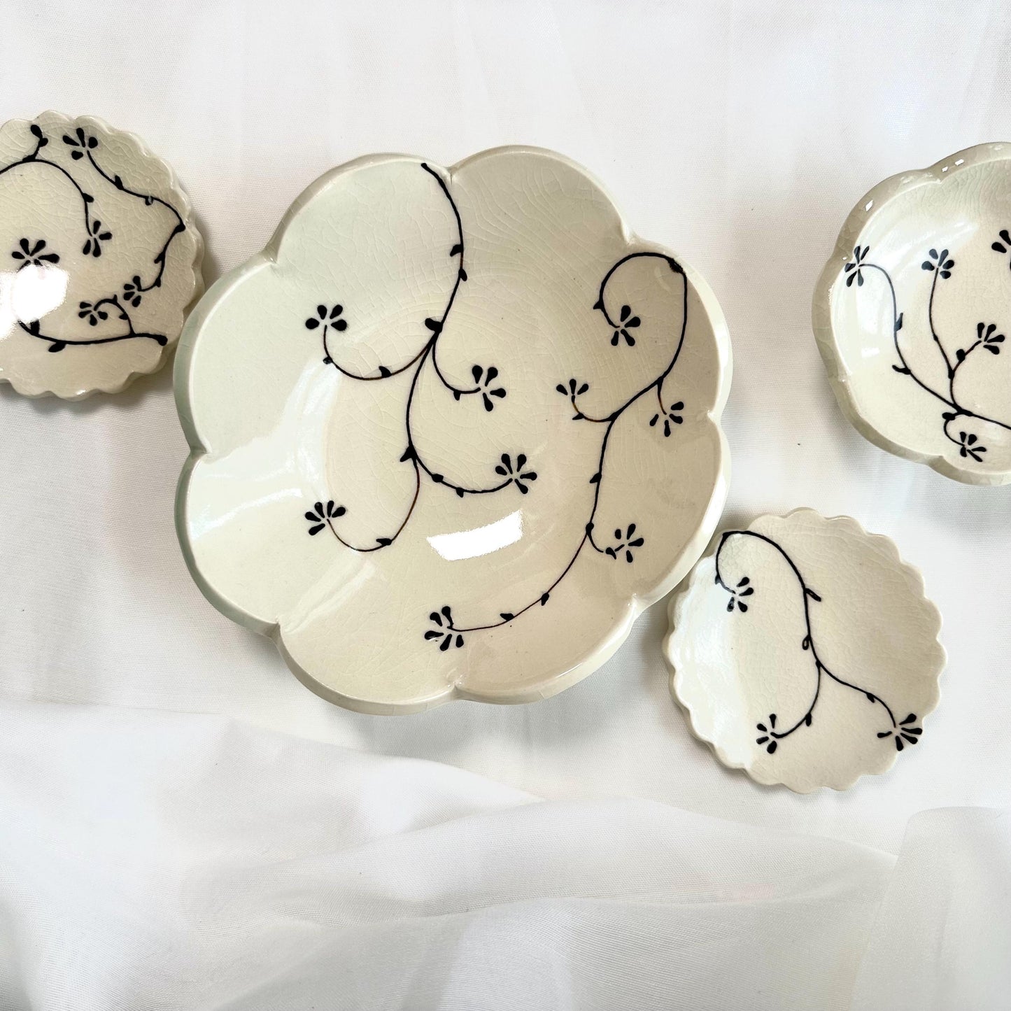 Handmade and hand painted pottery trinket dish, with handpainted brown underglaze and finished in a clear glaze, 3”