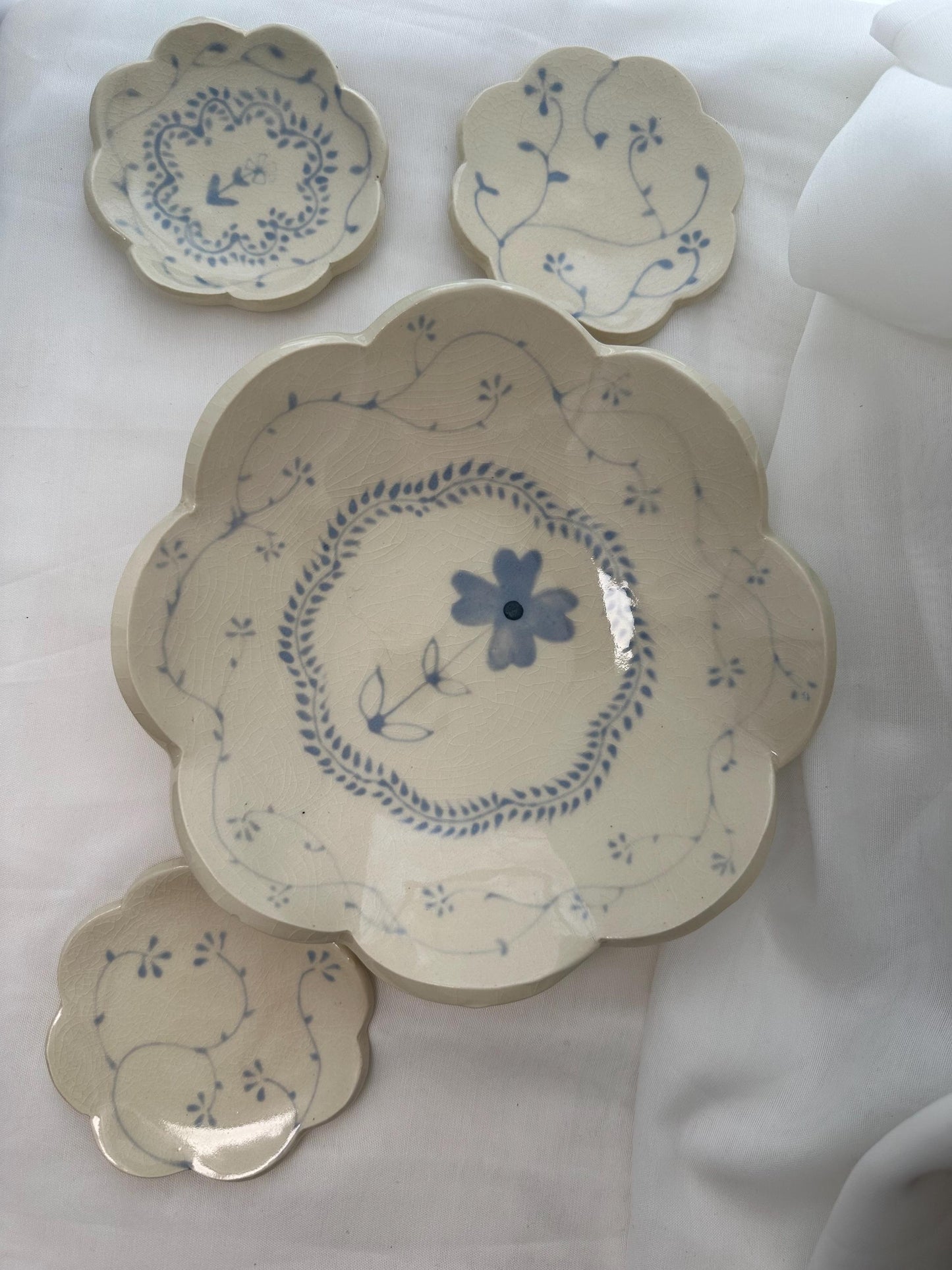 Handmade and hand painted pottery bowl, with handpainted blue underglaze and finished in a clear glaze, 4”