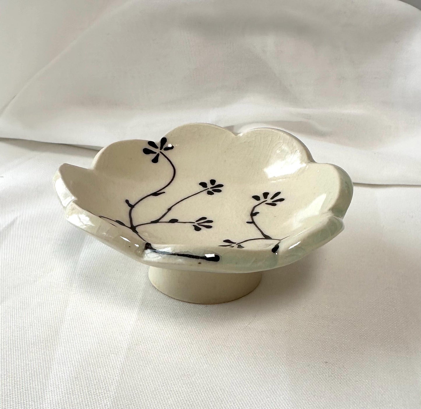 Handmade and hand painted pottery trinket dish, with handpainted brown underglaze and finished in a clear glaze, 3”