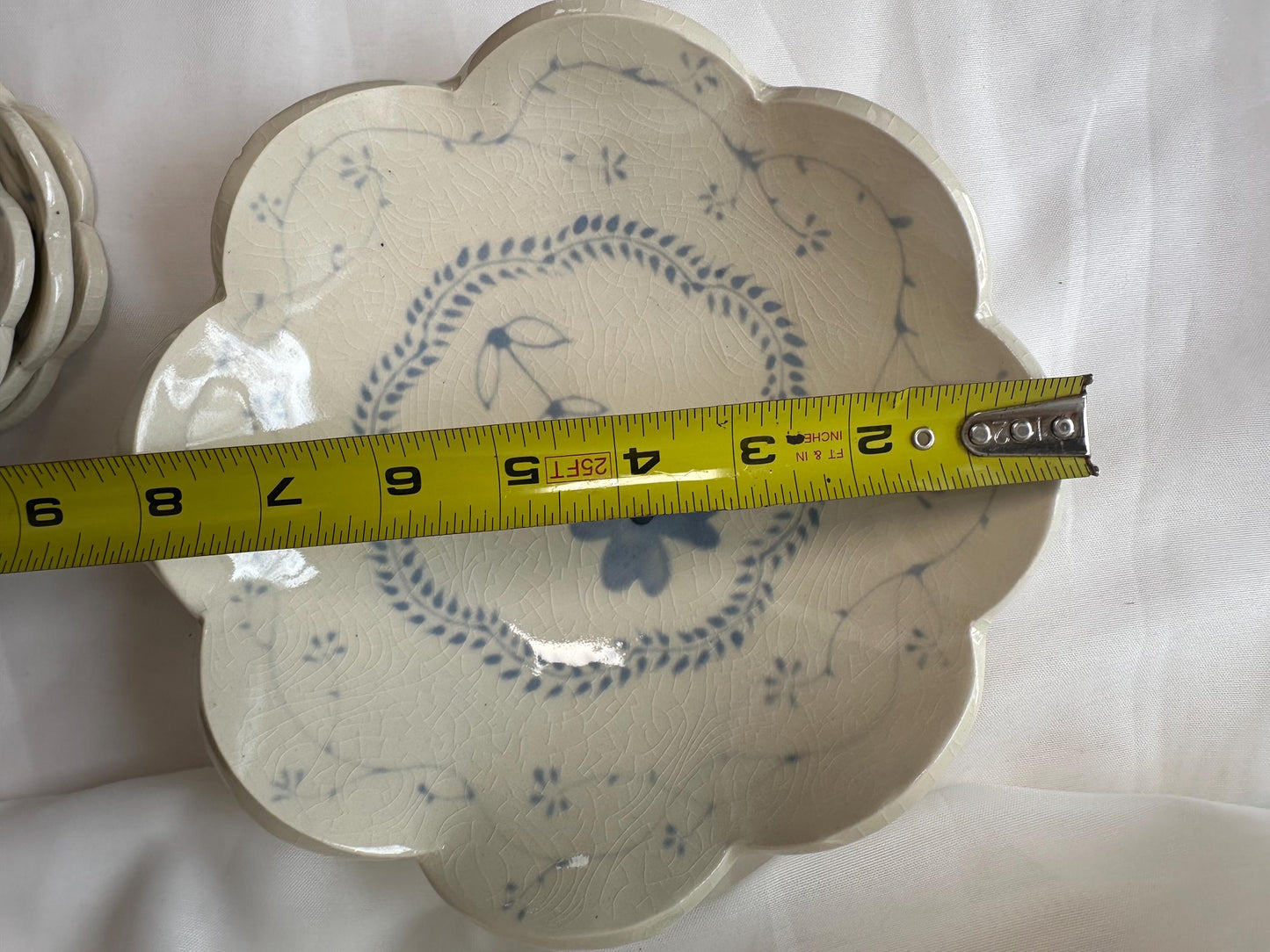 Handmade and hand painted pottery bowl, with handpainted blue underglaze and finished in a clear glaze, 8”