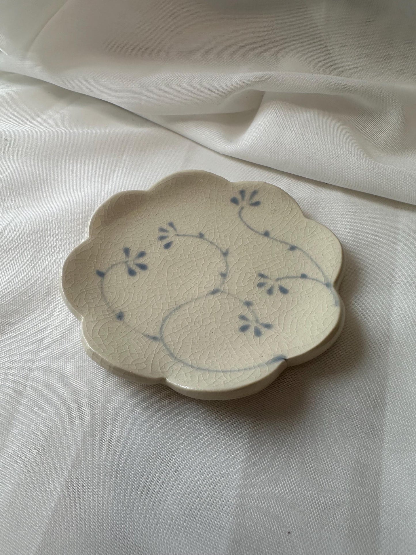 Handmade and hand painted pottery bowl,  with handpainted blue underglaze and finished in a clear glaze, 4”