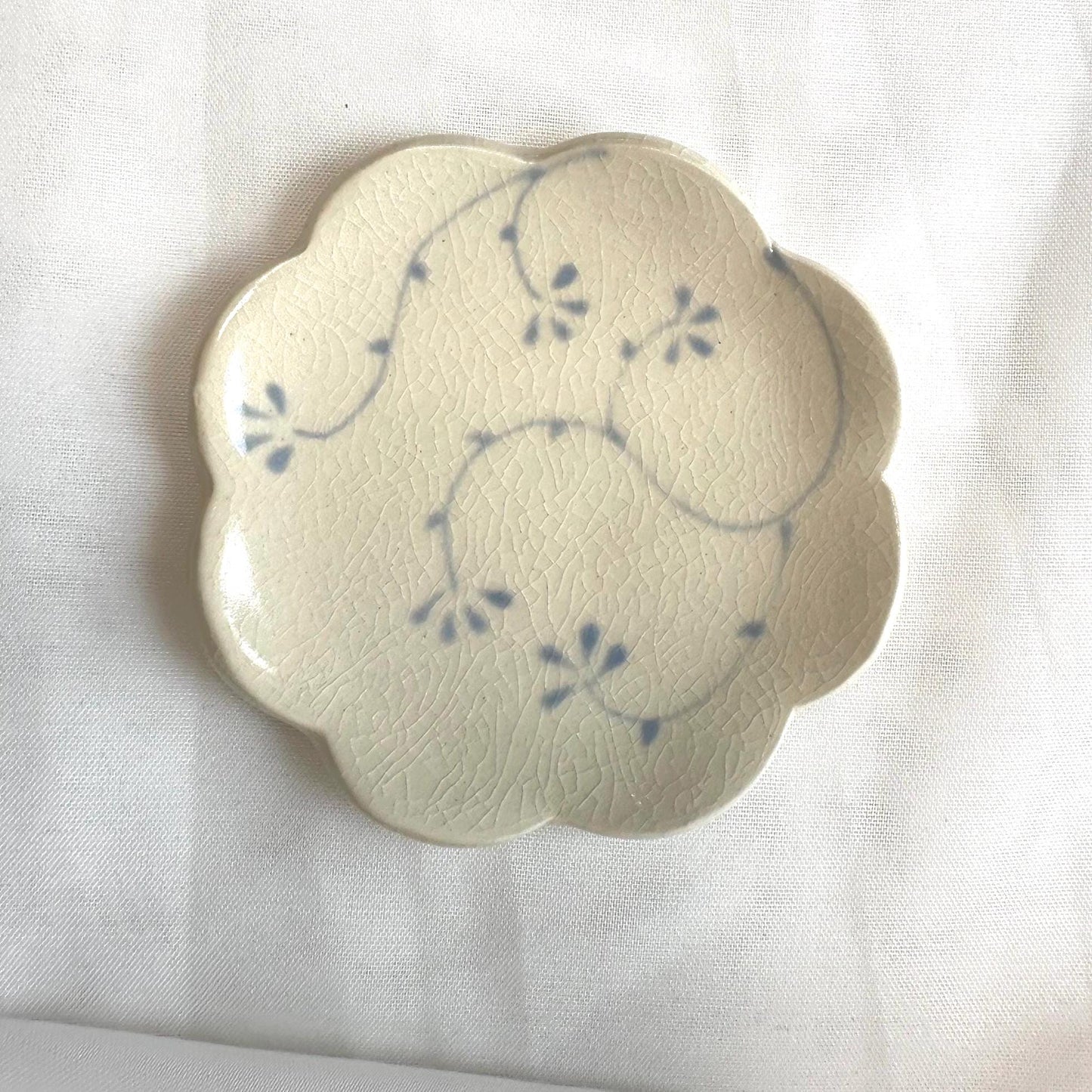Handmade and hand painted pottery bowl,  with handpainted blue underglaze and finished in a clear glaze, 4”