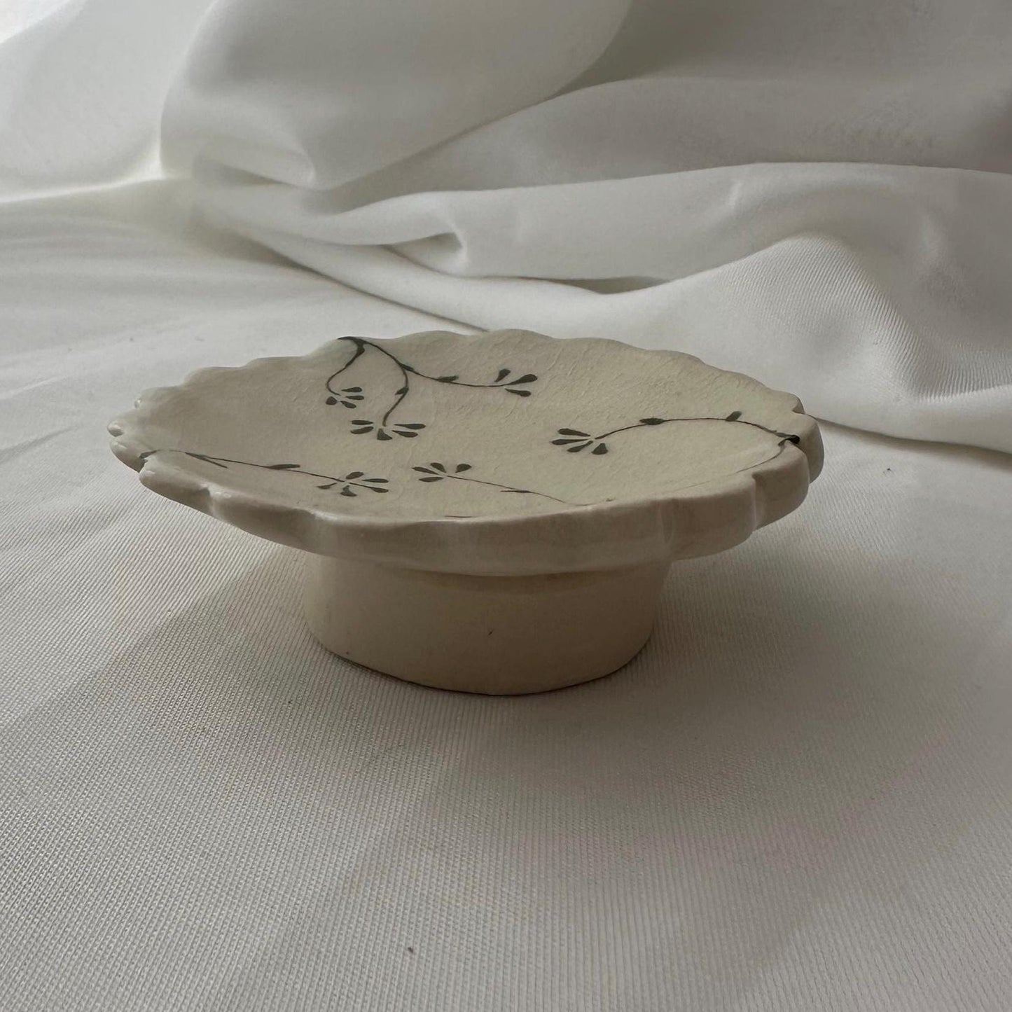 Handmade and hand painted pottery trinket dish,  with handpainted green underglaze and finished in a clear glaze, 3” with foot