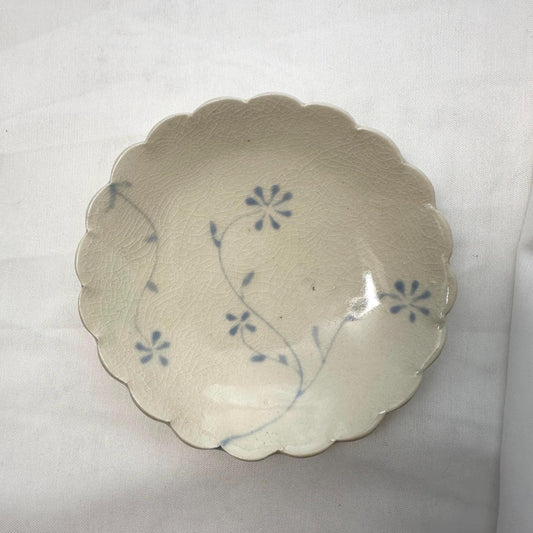 Handmade shallow scalloped bowl, with handpainted blue underglaze and finished in a clear glaze, 5”