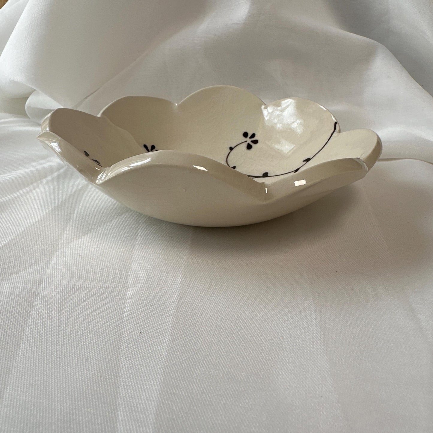 Handmade and hand painted pottery bowl,  with handpainted green underglaze and finished in a clear glaze, 7”
