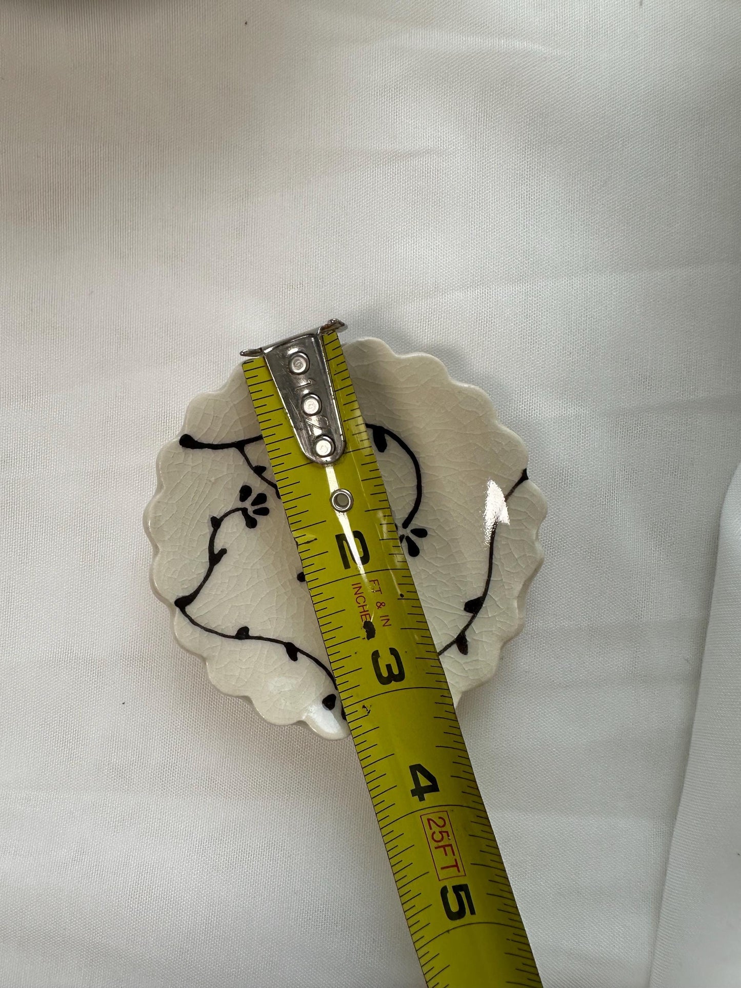 Handmade and hand painted pottery trinket dish,  with handpainted brown underglaze and finished in a clear glaze, 3”