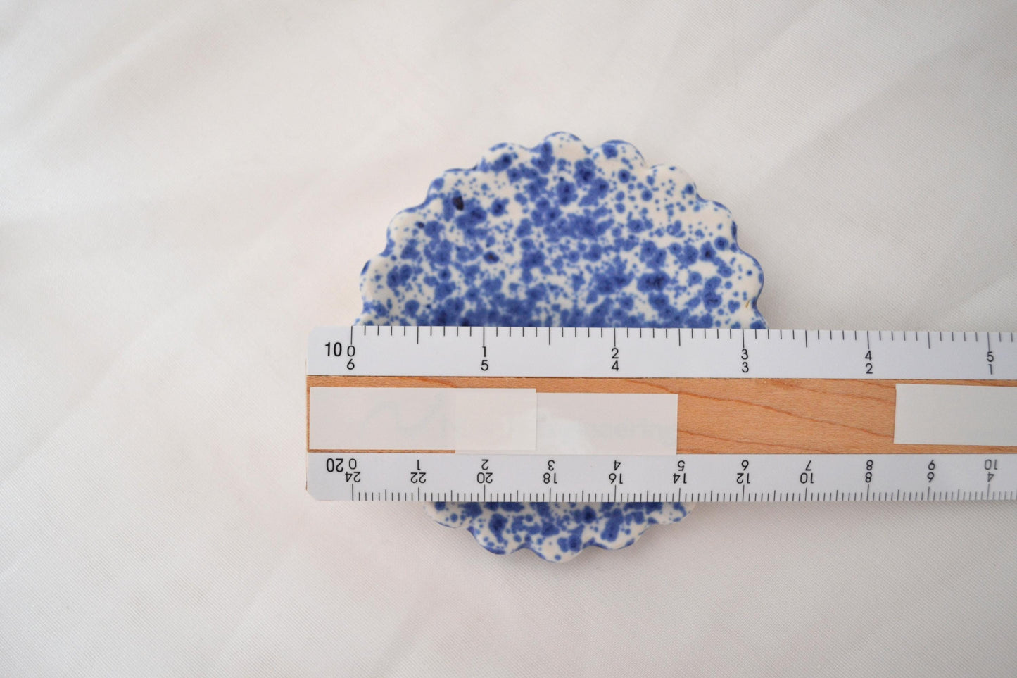 Handmade trinket dish with scalloped edges and vibrant blue splatterware glaze, Matte Finish, 3 Inches Diameter