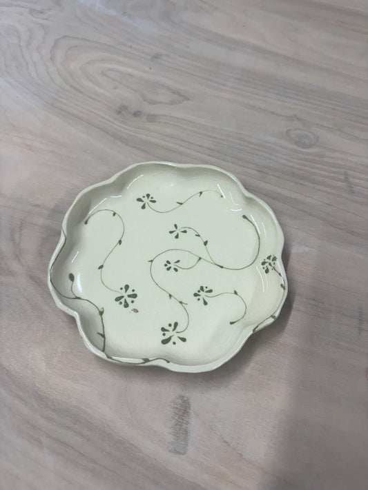 Handmade and hand painted pottery plate, scalloped edges, floral design hand painted in a sage green, finished with a clear crackle glaze