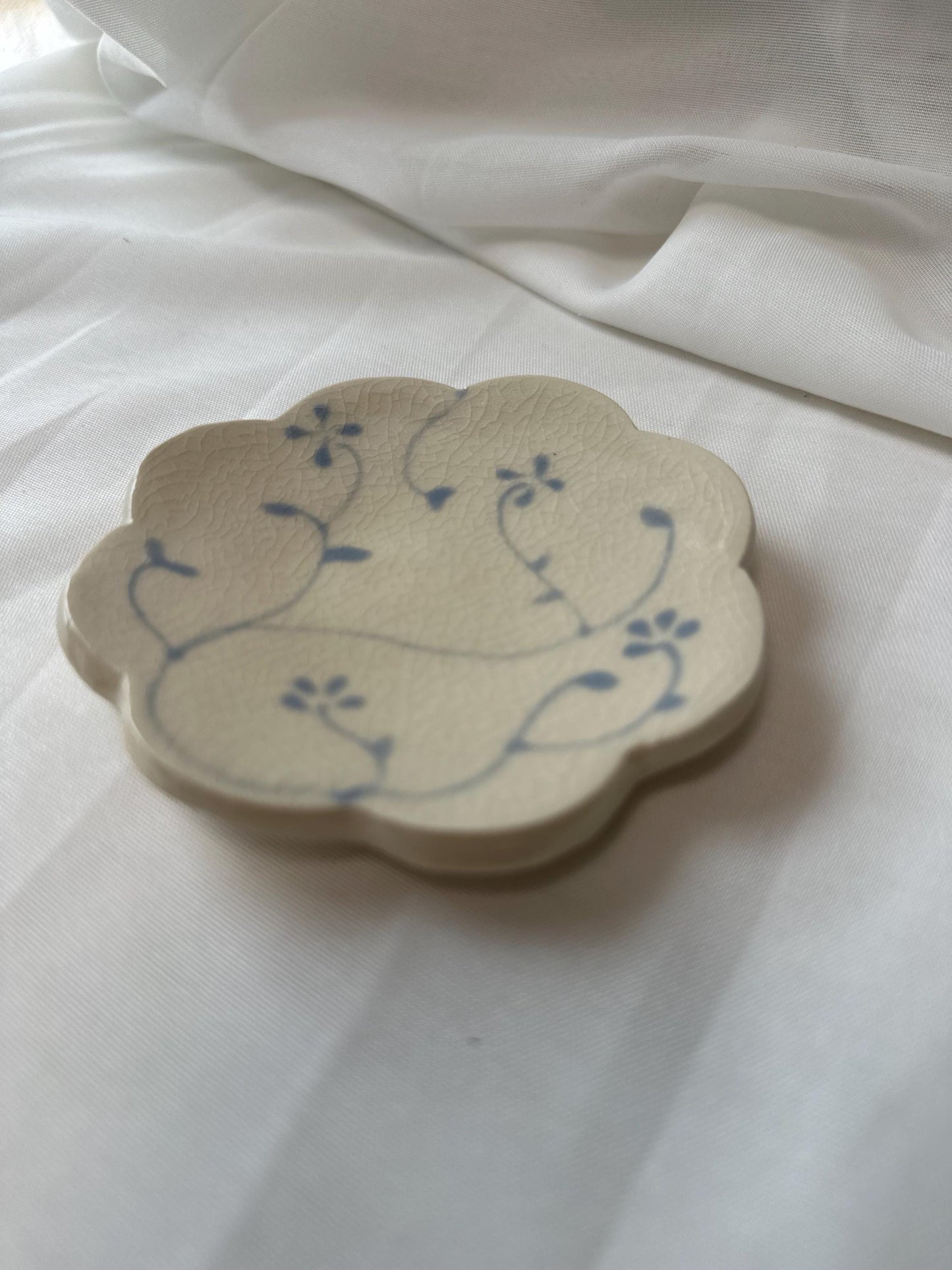 Handmade and hand painted pottery bowl,  with handpainted blue underglaze and finished in a clear glaze, 4”