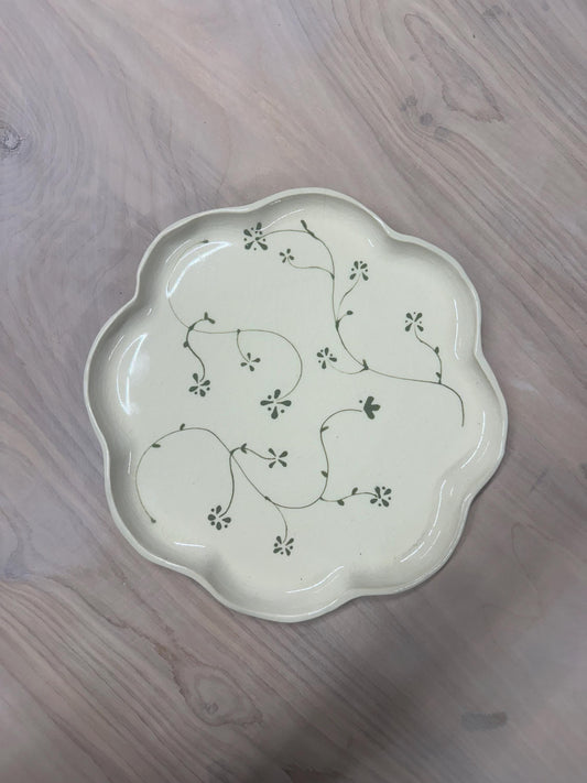 Handmade and hand painted pottery plate, scalloped edges, floral design hand painted in a sage green, finished with a clear crackle glaze