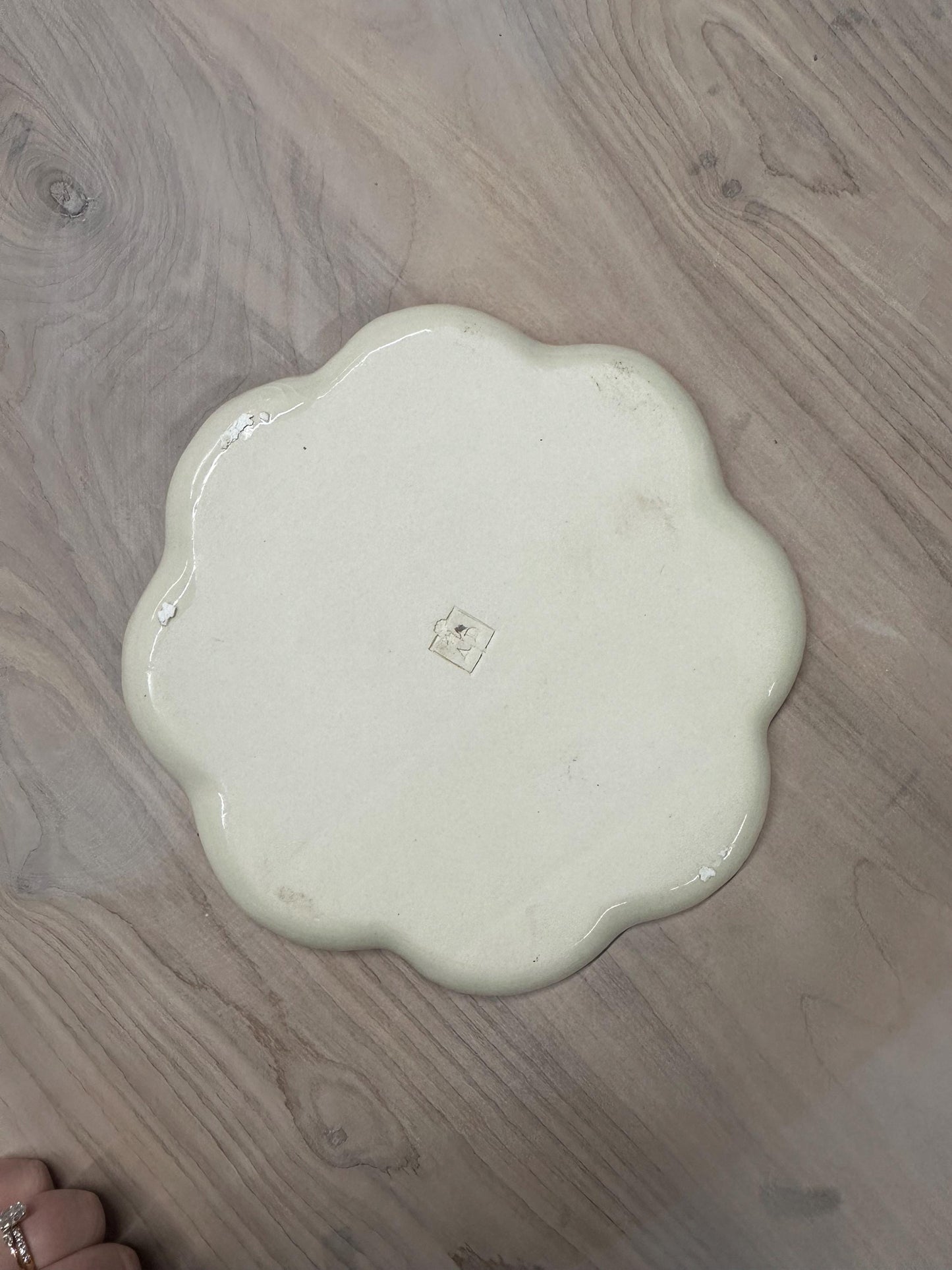 Handmade and hand painted pottery plate, scalloped edges, floral design hand painted in a sage green, finished with a clear crackle glaze